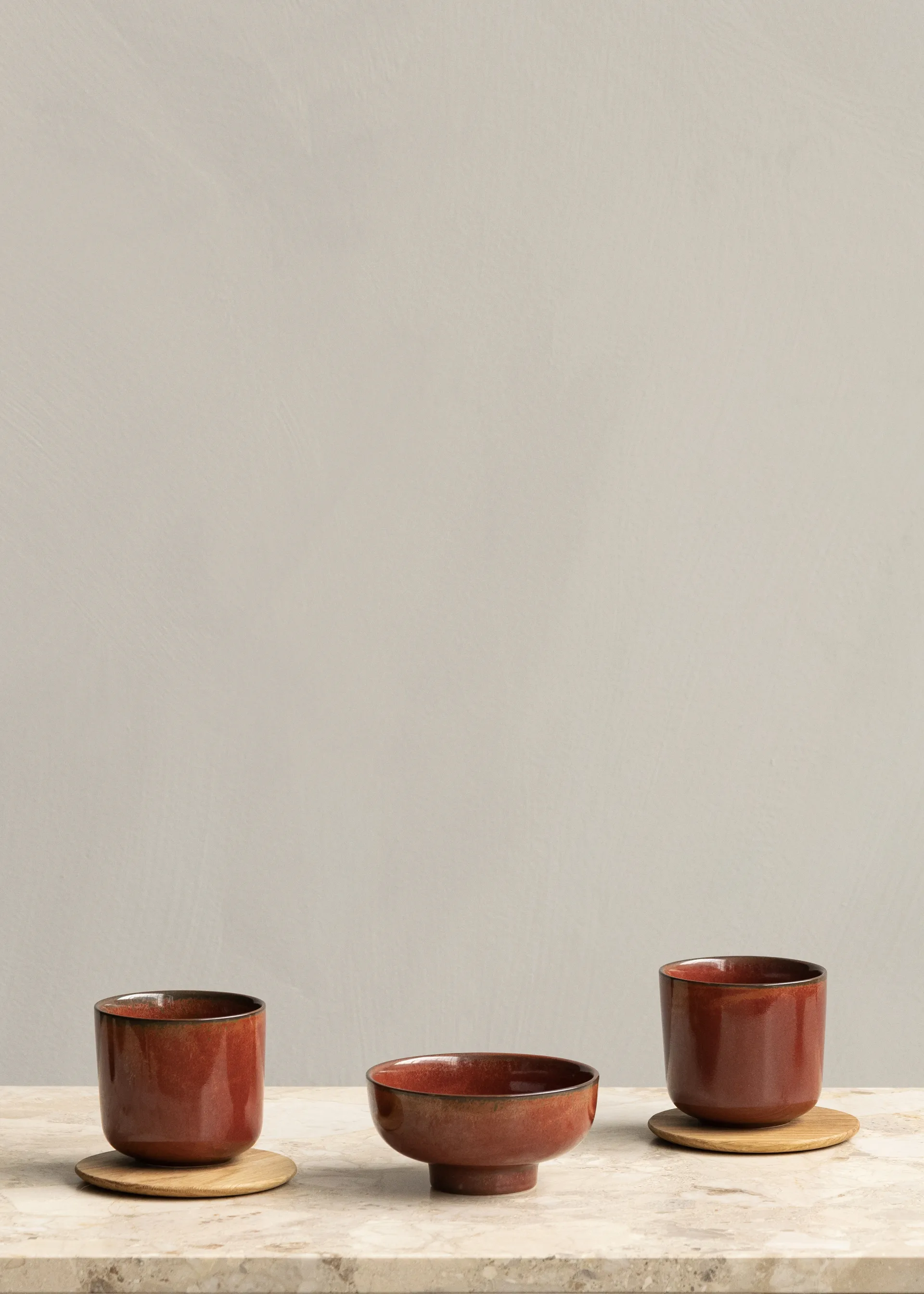 New Norm bowl on foot Ø12 cm, Red glazed Audo Copenhagen
