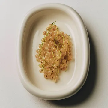 Barro oval serving plate - Off-white, large 27x36 cm - HAY