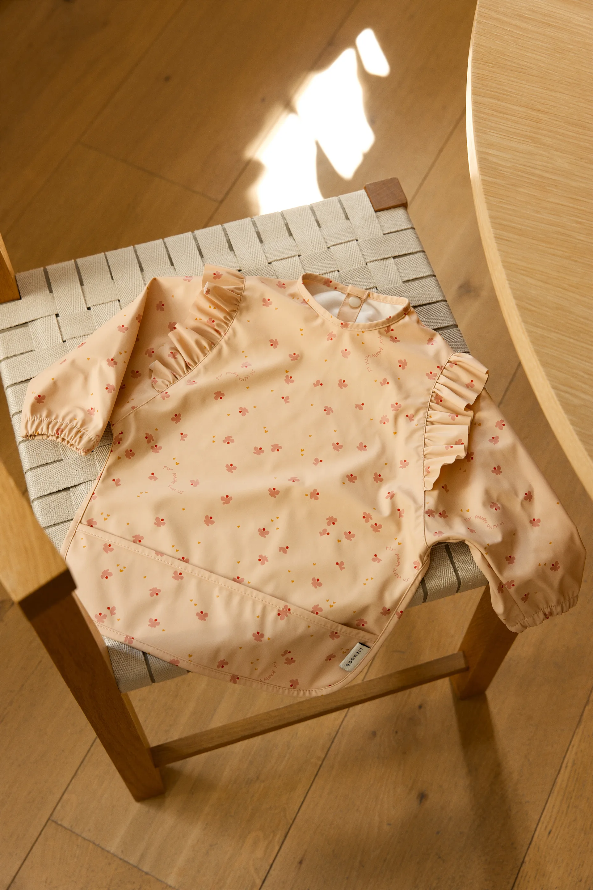 Merle ruffle bib with sleeves, Mini Butterfly-apple blossom Liewood