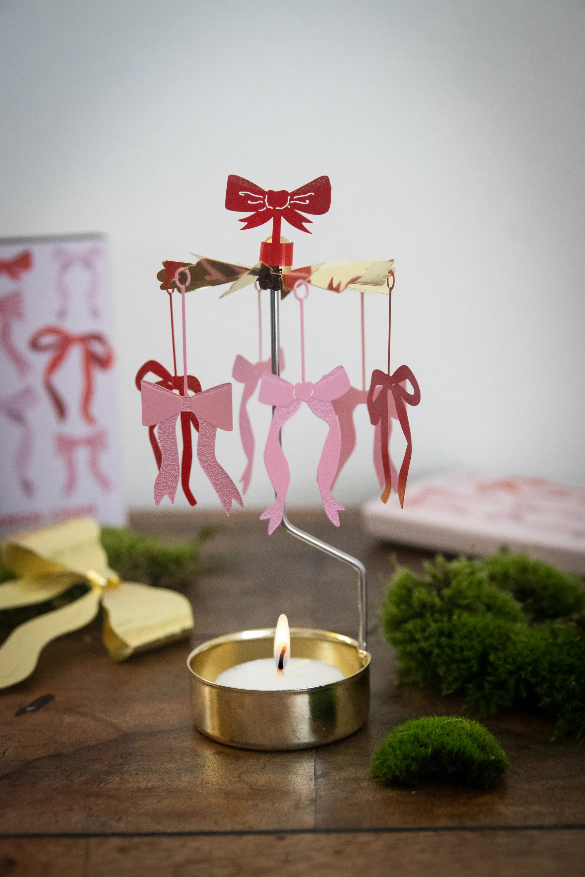Bow angel chime, Gold-red-pink Pluto Design