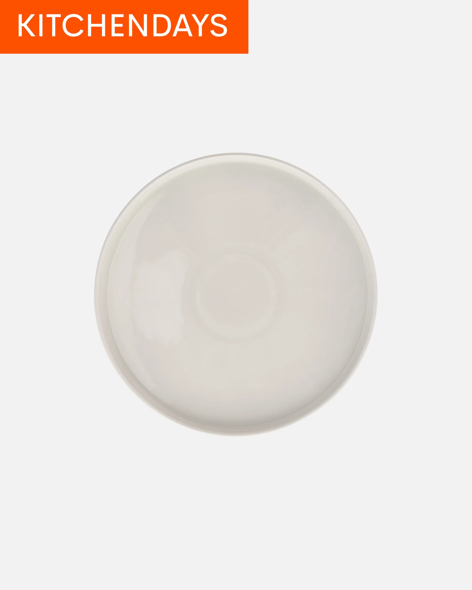 Round, off-white ceramic plate with a shallow rim and a subtle circular center.