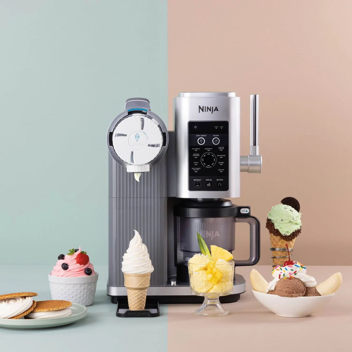 A silver soft-serve ice cream machine surrounded by various frozen treats like soft serve cones, sundaes, and sorbet.